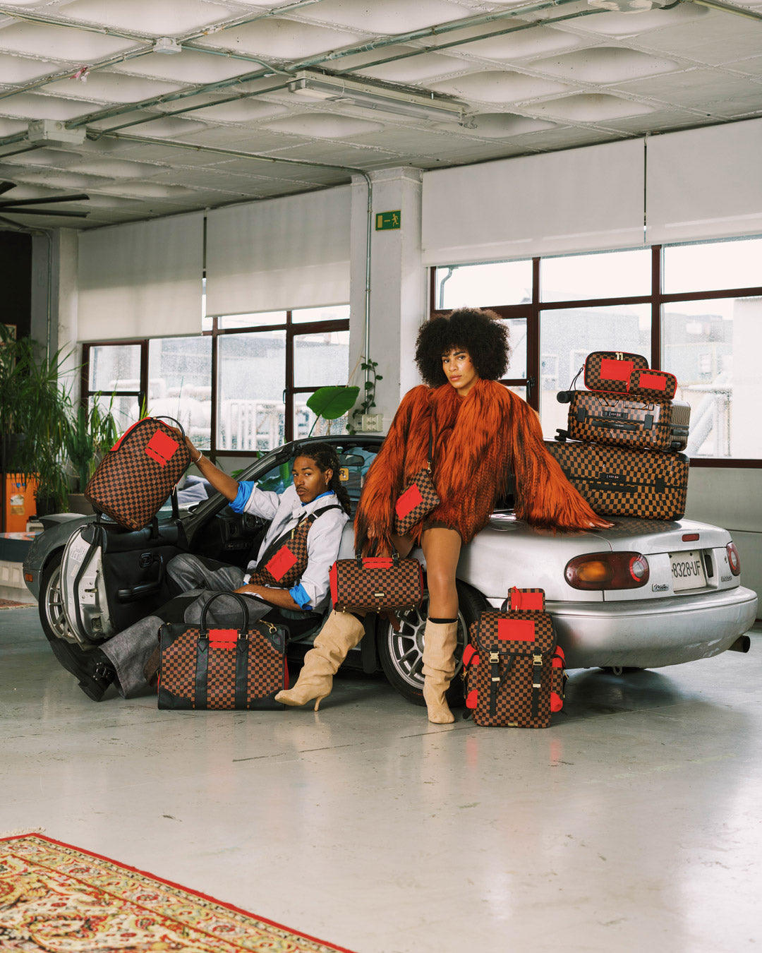 SPRAYGROUND® DUFFLE RED REDEMPTION MINI DUFFLE
