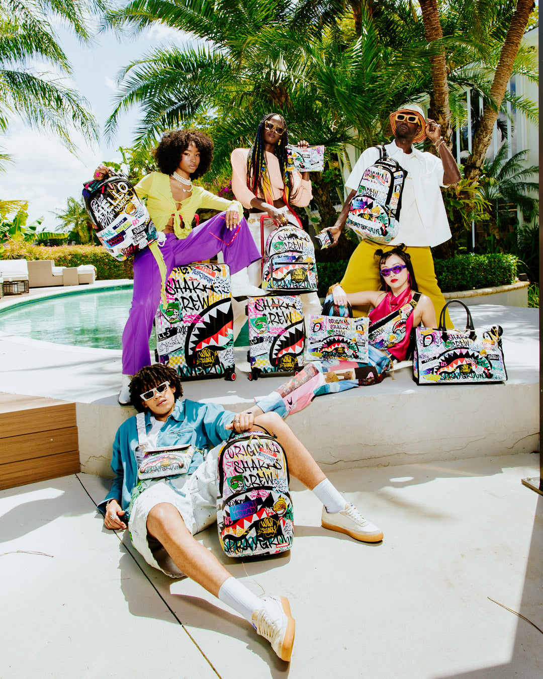 SPRAYGROUND® POUCHETTE CREATE ANOTHER DAY CROSSOVER CLUTCH W/ SHOULDER STRAP